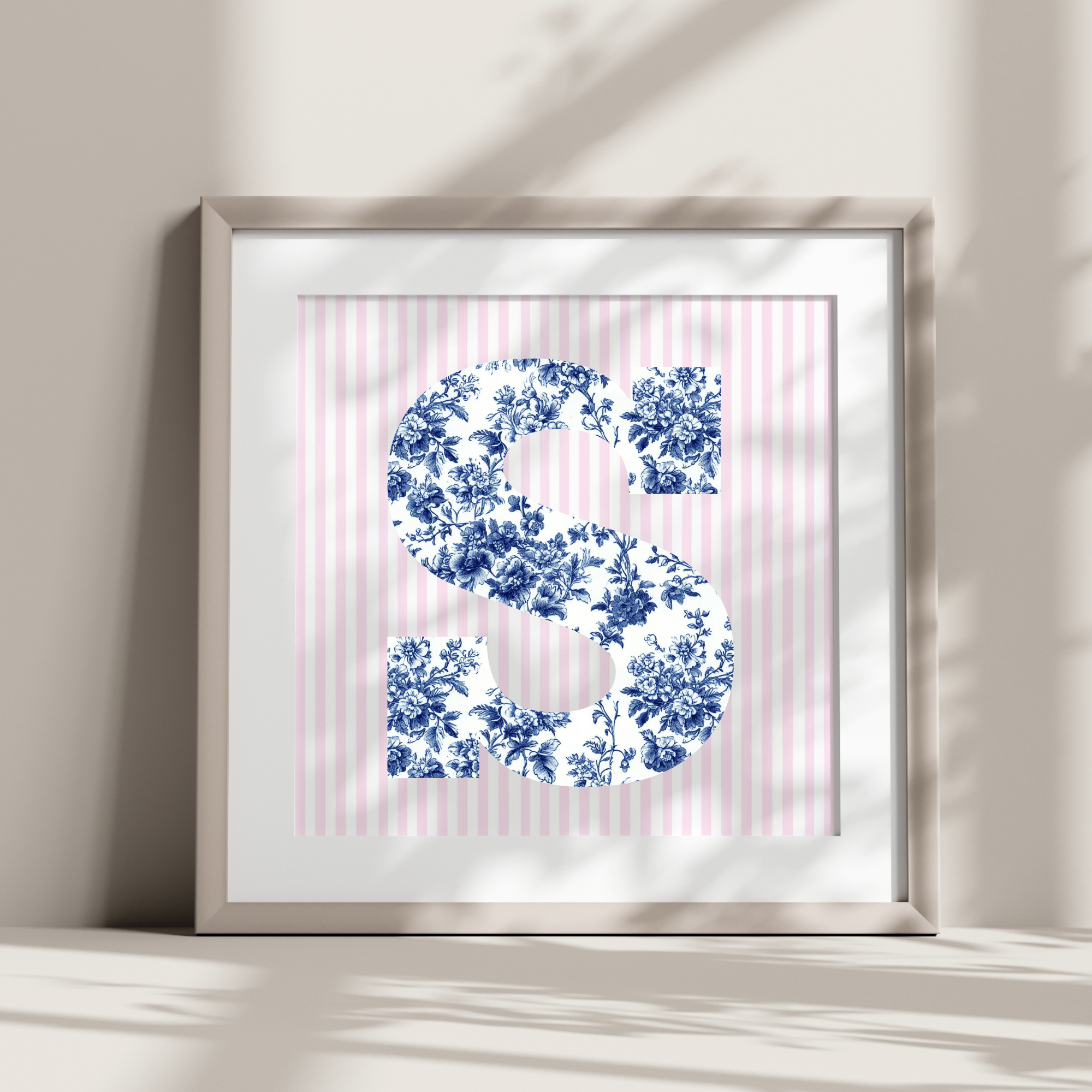 Custom Initial Monogram Letter Print. Letter is a blue toile chinoiserie preppy floral design with light pink stripes for the background. This is an actual print that needs to be framed. Printed on premium matte paper and can be used as decor for college dorm room Wall Art. Bedroom themes are Pink and Blue Coquette Coastal Room Decor.