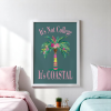 Coastal Carolina University Dorm Room Print in Pink and Teal, which includes a preppy palm tree with a teal. The text above and below the palm tree is Its Not College Its Coastal.